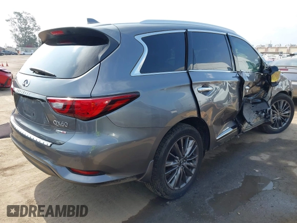 2020 Infiniti QX60 Luxe with VIN 5N1DL0MN2LC527549, listed as a IAAI auction lot 42408763 with 56,371 mi miles and . Bid and sale history available at DreamBid. Image 4.