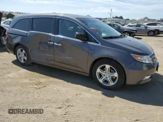 2012 Honda Odyssey Touring с VIN 5FNRL5H9XCB116455, выставлен на аукционе Copart как лот 60880835 с пробегом 96 672 миль миль и Списание • Salvage title. История ставок и продаж доступна на DreamBid. Изображение 4.