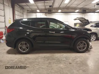 2017 Hyundai Santa Fe 2.4L with VIN 5NMZUDLBXHH041621, listed as a IAAI auction lot 42194586 with 91,012 mi miles and . Bid and sale history available at DreamBid. Image 14.