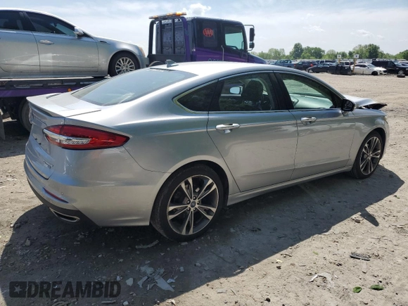 2020 Ford Fusion Titanium with VIN 3FA6P0D93LR180244, listed as a Copart auction lot 57102055 with 34,868 mi miles and Salvage title. Bid and sale history available at DreamBid. Image 3.