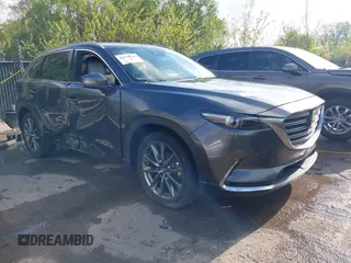 2020 Mazda CX-9 Signature with VIN JM3TCBEYXL0402053, listed as a IAAI auction lot 42070846 with 47,695 mi miles and . Bid and sale history available at DreamBid. Image 1.