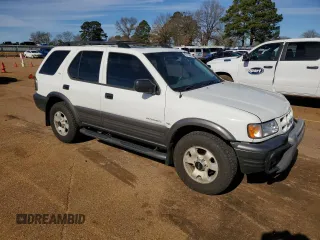 2001 Isuzu Rodeo S with VIN 4S2DM58W114343183, listed as a Copart auction lot 88128465 with 85,926 mi miles and Salvage Title. Bid and sale history available at DreamBid. Image 4.