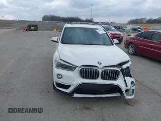 2016 BMW X1 xDrive28i with VIN WBXHT3C35GP886144, listed as a IAAI auction lot 41954742 with 89,268 mi miles. Bid and sale history available at carsss.com. Image 19.