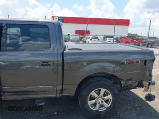 2019 Ford F-150 XL with VIN 1FTEW1E52KKE98899, listed as a IAAI auction lot 42576904 with 168,223 mi miles and . Bid and sale history available at DreamBid. Image 19.