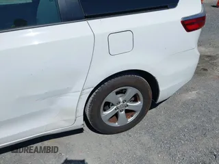 2015 Toyota Sienna L with VIN 5TDZK3DC3FS690484, listed as a IAAI auction lot 41888073 with 201,518 mi miles and . Bid and sale history available at carsss.com. Image 17.