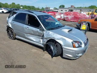 2004 Subaru Impreza WRX Special Sports with VIN JF1GG29644G801112, listed as a IAAI auction lot 42241729 with 215,135 mi miles and . Bid and sale history available at DreamBid. Image 1.