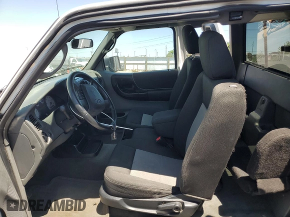 2010 Ford Ranger XLT with VIN 1FTLR4FE4APA21472, listed as a Copart auction lot 63842785 with 122,911 mi miles and Salvage title. Bid and sale history available at DreamBid. Image 7.