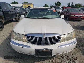 1999 Lincoln Continental with VIN 1LNHM97V9XY711717, listed as a Copart auction lot 53091025 with 0 mi miles and Clean Title. Bid and sale history available at carsss.com. Image 5.