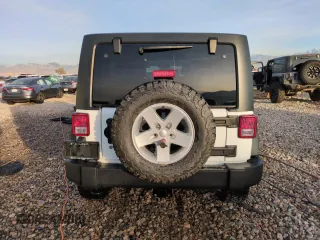 2018 Jeep Wrangler JK Unlimited Sport S with VIN 1C4BJWDG6JL890665, listed as a Copart auction lot 83833854 with 23,390 mi miles and Salvage Title. Bid and sale history available at carsss.com. Image 6.