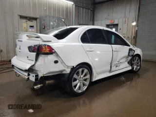 2014 Mitsubishi Lancer GT with VIN JA32U8FWXEU023131, listed as a Copart auction lot 44616945 with 84,977 mi miles and Salvage Title. Bid and sale history available at carsss.com. Image 3.