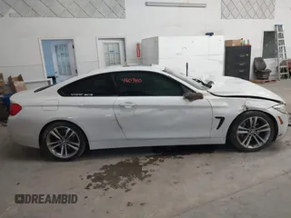 2015 BMW 4 Series 435i с VIN WBA3R1C50FK193678, выставлен на аукционе IAAI как лот 41603410 с пробегом 118 318 миль миль и . История ставок и продаж доступна на DreamBid. Изображение 13.