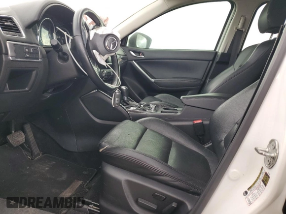 2016 Mazda CX-5 Grand Touring with VIN JM3KE2DYXG0784971, listed as a Copart auction lot 43865605 with 146,025 mi miles and Salvage Title. Bid and sale history available at carsss.com. Image 7.