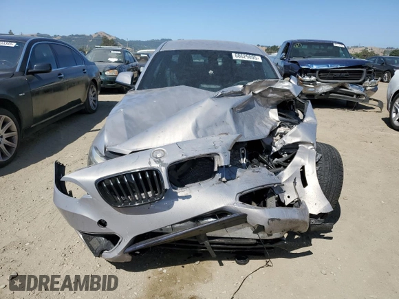 2016 BMW 2 Series 228i with VIN WBA1F9C53GV545568, listed as a Copart auction lot 60629805 with 67,530 mi miles and Salvage title. Bid and sale history available at DreamBid. Image 5.