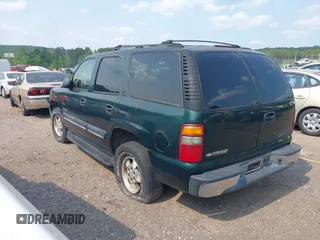 2002 Chevrolet Tahoe LS with VIN 1GNEC13V92J308220, listed as a IAAI auction lot 42362047 with 230,859 mi miles and . Bid and sale history available at DreamBid. Image 3.