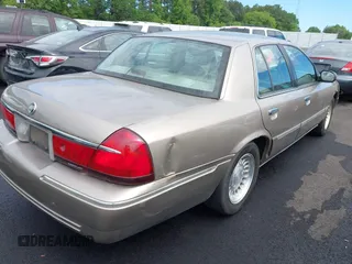 2001 Mercury Grand Marquis LS z VIN 2MEFM75W11X610723, wystawiony jako IAAI lot #42208567 z przebiegiem 190 397 mil mil oraz . Historia ofert i sprzedaży dostępna na DreamBid. Obrazek 4.