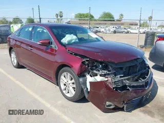 2015 Toyota Avalon Limited with VIN 4T1BK1EB6FU164272, listed as a IAAI auction lot 41891894 with 207,847 mi miles and . Bid and sale history available at DreamBid. Image 1.
