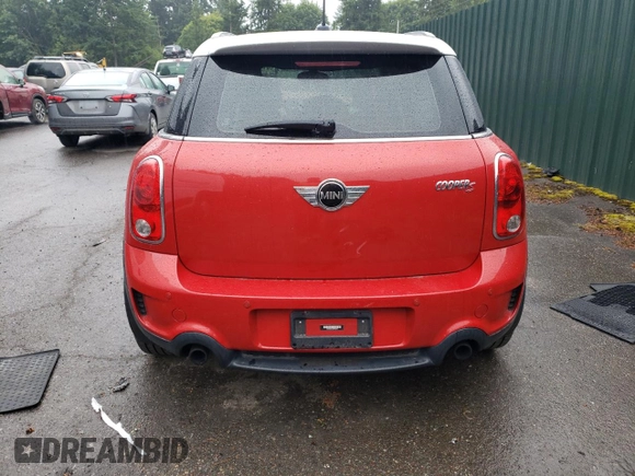 2014 MINI Countryman S with VIN WMWZC3C52EWP25379, listed as a Copart auction lot 61438355 with 76,943 mi miles and Salvage title. Bid and sale history available at DreamBid. Image 6.