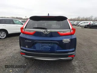 2019 Honda CR-V EX with VIN 2HKRW2H54KH630921, listed as a IAAI auction lot 41366277 with 103,075 mi miles and . Bid and sale history available at DreamBid. Image 17.