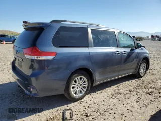 2014 Toyota Sienna XLE with VIN 5TDYK3DC5ES467244, listed as a Copart auction lot 54777445 with 157,503 mi miles and Salvage Title. Bid and sale history available at DreamBid. Image 3.
