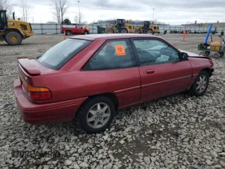 1996 Ford Escort z VIN 3FASP11J6TR151727, wystawiony jako Copart lot #55487725 z przebiegiem 118 276 mil mil oraz Nie do naprawy. Historia ofert i sprzedaży dostępna na DreamBid. Obrazek 3.