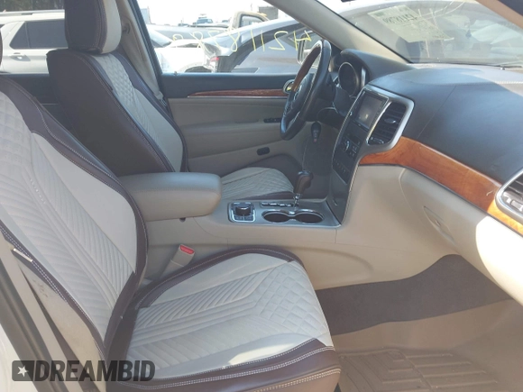 2011 Jeep Grand Cherokee Overland Summit with VIN 1J4RR6GT9BC546825, listed as a IAAI auction lot 42118789 with 123,449 mi miles. Bid and sale history available at carsss.com. Image 5.