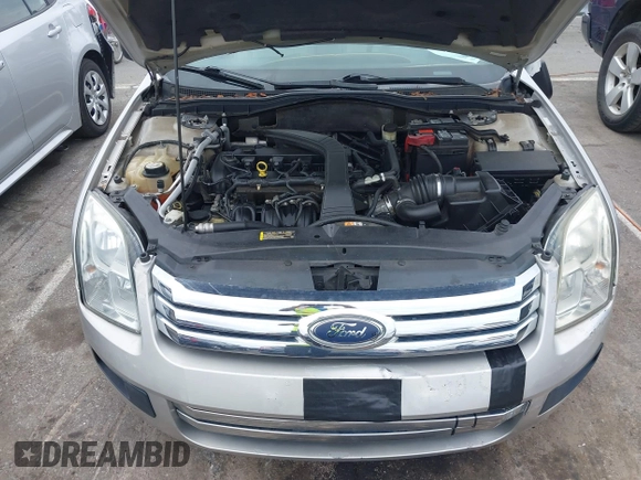 2008 Ford Fusion S with VIN 3FAHP06ZX8R123780, listed as a IAAI auction lot 40365258 with 100,661 mi miles. Bid and sale history available at carsss.com. Image 10.