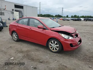 2012 Hyundai Accent GLS z VIN KMHCU4AE1CU270091, wystawiony jako Copart lot #56623905 z przebiegiem 185 477 mil mil oraz Szkody całkowita. Historia ofert i sprzedaży dostępna na DreamBid. Obrazek 4.