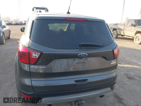 2019 Ford Escape SE with VIN 1FMCU0GD2KUA40307, listed as a IAAI auction lot 41791584 with 71,395 mi miles and . Bid and sale history available at carsss.com. Image 16.