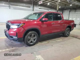 2023 Honda Ridgeline RTL-E with VIN 5FPYK3F72PB050842, listed as a Copart auction lot 60847465 with 47,145 mi miles and Salvage title. Bid and sale history available at DreamBid. Image 1.