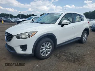 2016 Mazda CX-5 Sport with VIN JM3KE2BY6G0743479, listed as a Copart auction lot 65683005 with 189,308 mi miles and Salvage title. Bid and sale history available at DreamBid. Image 1.