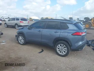 2022 Toyota Corolla Cross LE with VIN 7MUCAAAG0NV018245, listed as a IAAI auction lot 42039762 with 26,690 mi miles and . Bid and sale history available at DreamBid. Image 3.