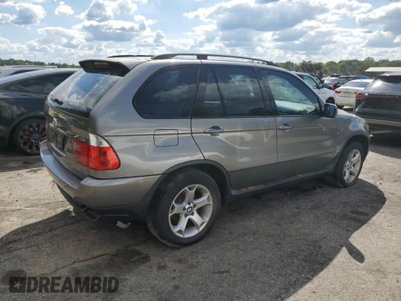 2006 BMW X5 3.0i with VIN 5UXFA13596LY39333, listed as a Copart auction lot 74065624 with 209,454 mi miles and Salvage Title. Bid and sale history available at carsss.com. Image 3.