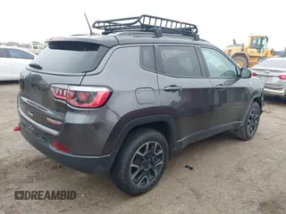 2019 Jeep Compass Trailhawk with VIN 3C4NJDDB1KT739938, listed as a IAAI auction lot 41411173 with 140,396 mi miles and . Bid and sale history available at carsss.com. Image 4.