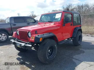 2002 Jeep Wrangler X with VIN 1J4FA39S02P739211, listed as a IAAI auction lot 41665910 with 144,118 mi miles. Bid and sale history available at carsss.com. Image 17.