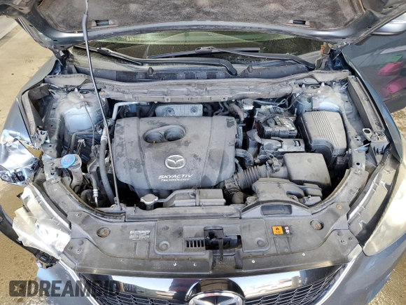 2015 Mazda CX-5 Sport with VIN JM3KE4BY9F0552942, listed as a Copart auction lot 54750245 with 129,700 mi miles and Salvage title. Bid and sale history available at DreamBid. Image 12.