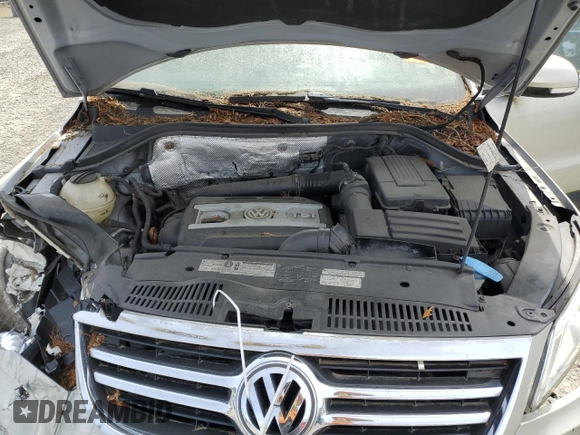 2011 Volkswagen Tiguan SEL z VIN WVGBV7AX6BW559854, wystawiony jako Copart lot #56268195 z przebiegiem 107 428 mil mil oraz Czysty tytuł • Clean title. Historia ofert i sprzedaży dostępna na DreamBid. Obrazek 12.