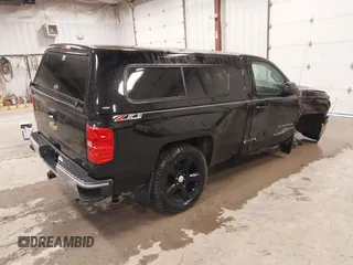 2015 Chevrolet Silverado 1500 LT with VIN 1GCNKREC7FZ176054, listed as a IAAI auction lot 41940955 with 197,857 mi miles and . Bid and sale history available at DreamBid. Image 4.