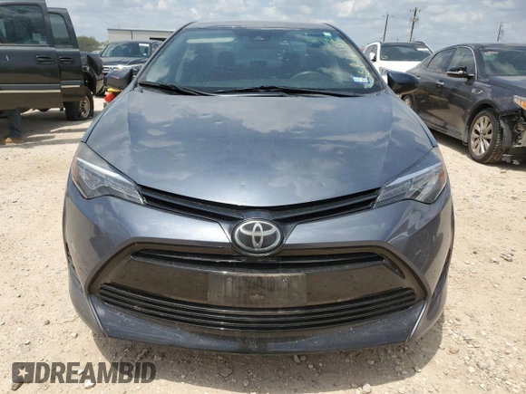 2019 Toyota Corolla L z VIN 5YFBURHE4KP944300, wystawiony jako Copart lot #55816195 z przebiegiem 56 951 mil mil oraz Szkoda całkowita • Salvage title. Historia ofert i sprzedaży dostępna na DreamBid. Obrazek 5.