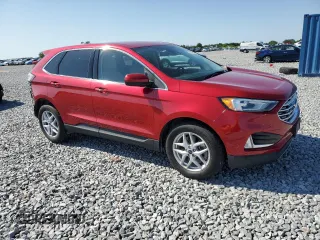 2021 Ford Edge SEL with VIN 2FMPK4J9XMBA16252, listed as a Copart auction lot 52359335 with 56,889 mi miles and Salvage Title. Bid and sale history available at carsss.com. Image 4.
