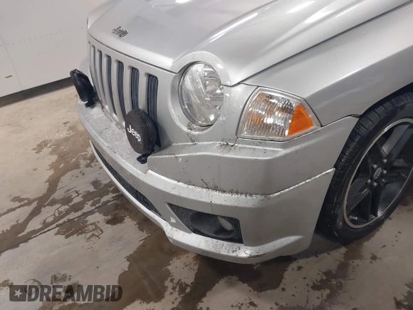 2008 Jeep Compass Sport with VIN 1J8FF47W88D651805, listed as a IAAI auction lot 40960467 with 205,414 mi miles and . Bid and sale history available at carsss.com. Image 6.
