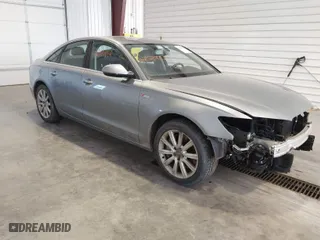 2013 Audi A6 3.0T Premium Plus with VIN WAUGGAFC3DN066310, listed as a IAAI auction lot 42020702 with 195,939 mi miles. Bid and sale history available at carsss.com. Image 1.