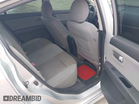 2012 Nissan Sentra S with VIN 3N1AB6AP7CL618925, listed as a IAAI auction lot 42194536 with 193,707 mi miles and . Bid and sale history available at DreamBid. Image 8.