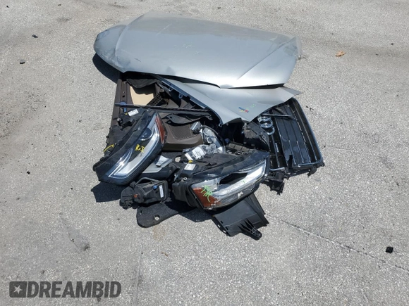 2015 Audi A4 Premium z VIN WAUBFAFL2FN009094, wystawiony jako Copart lot #57203785 z przebiegiem 84 066 mil mil oraz Szkoda całkowita • Salvage title. Historia ofert i sprzedaży dostępna na DreamBid. Obrazek 12.