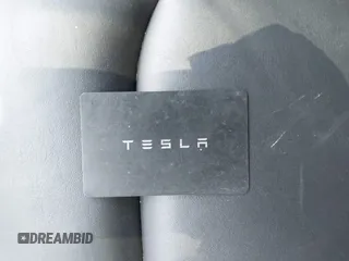 2023 Tesla Model 3 with VIN 5YJ3E1EA7PF409243, listed as a IAAI auction lot 42305360 with Not provided miles and . Bid and sale history available at DreamBid. Image 11.