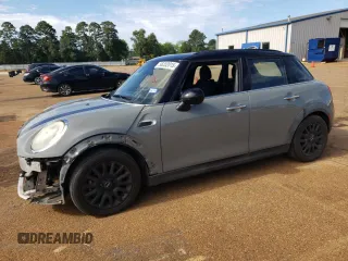 2016 MINI Hardtop 4 Door z VIN WMWXU1C51G2D09247, wystawiony jako Copart lot #56202015 z przebiegiem 64 367 mil mil oraz Szkoda całkowita • Salvage title. Historia ofert i sprzedaży dostępna na DreamBid. Obrazek 1.