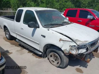 2003 Ford F-150 XL with VIN 1FTRX17243KA96403, listed as a IAAI auction lot 42017173 with 195,120 mi miles. Bid and sale history available at carsss.com. Image 1.