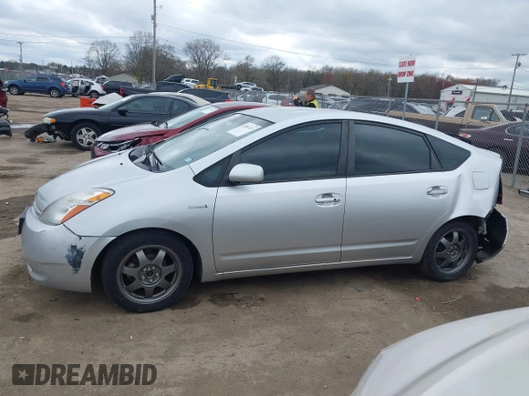2007 Toyota Prius z VIN JTDKB20U977666406, wystawiony jako IAAI lot #42081233 z przebiegiem Nie podano mil oraz . Historia ofert i sprzedaży dostępna na DreamBid. Obrazek 14.
