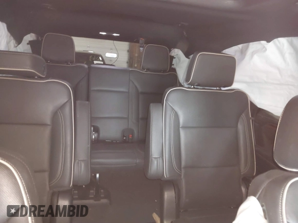2023 Chevrolet Tahoe Premier with VIN 1GNSKSKD0PR217513, listed as a IAAI auction lot 41779222 with 55,424 mi miles and . Bid and sale history available at DreamBid. Image 8.