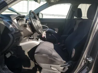 2012 Mitsubishi Outlander ES with VIN JA4AS2AW0CU025825, listed as a Copart auction lot 53082065 with 124,004 mi miles and Salvage Title. Bid and sale history available at carsss.com. Image 7.