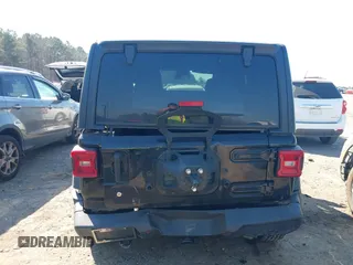 2020 Jeep Wrangler Unlimited Black and Tan with VIN 1C4HJXDGXLW219078, listed as a IAAI auction lot 41783437 with 59,137 mi miles and . Bid and sale history available at DreamBid. Image 17.